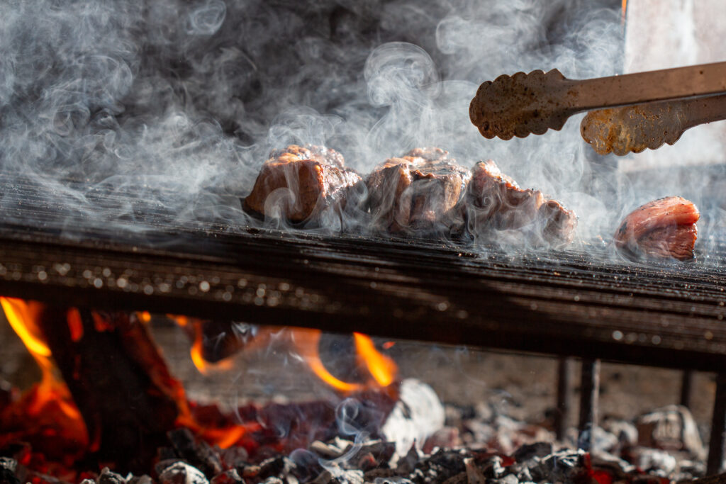 foodiesfeed.com grilling beef on charcoal